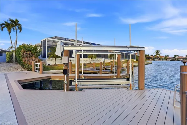 a view of a house with a roof deck