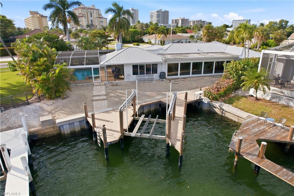339 Landmark Street Marco Island, FL 34145 - Photo 49 of 49 a aerial view of a house with a yard