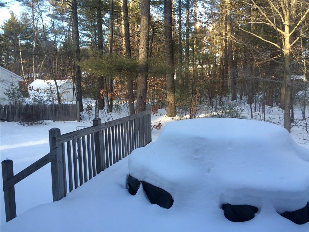 24 Timber Lane Waterboro, ME 04061 - Photo 11 of 14 Back yard & deck off the dining room