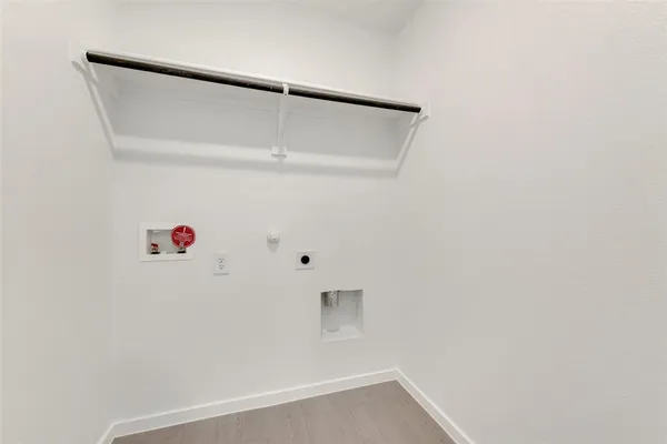 an empty room with a empty space and windows