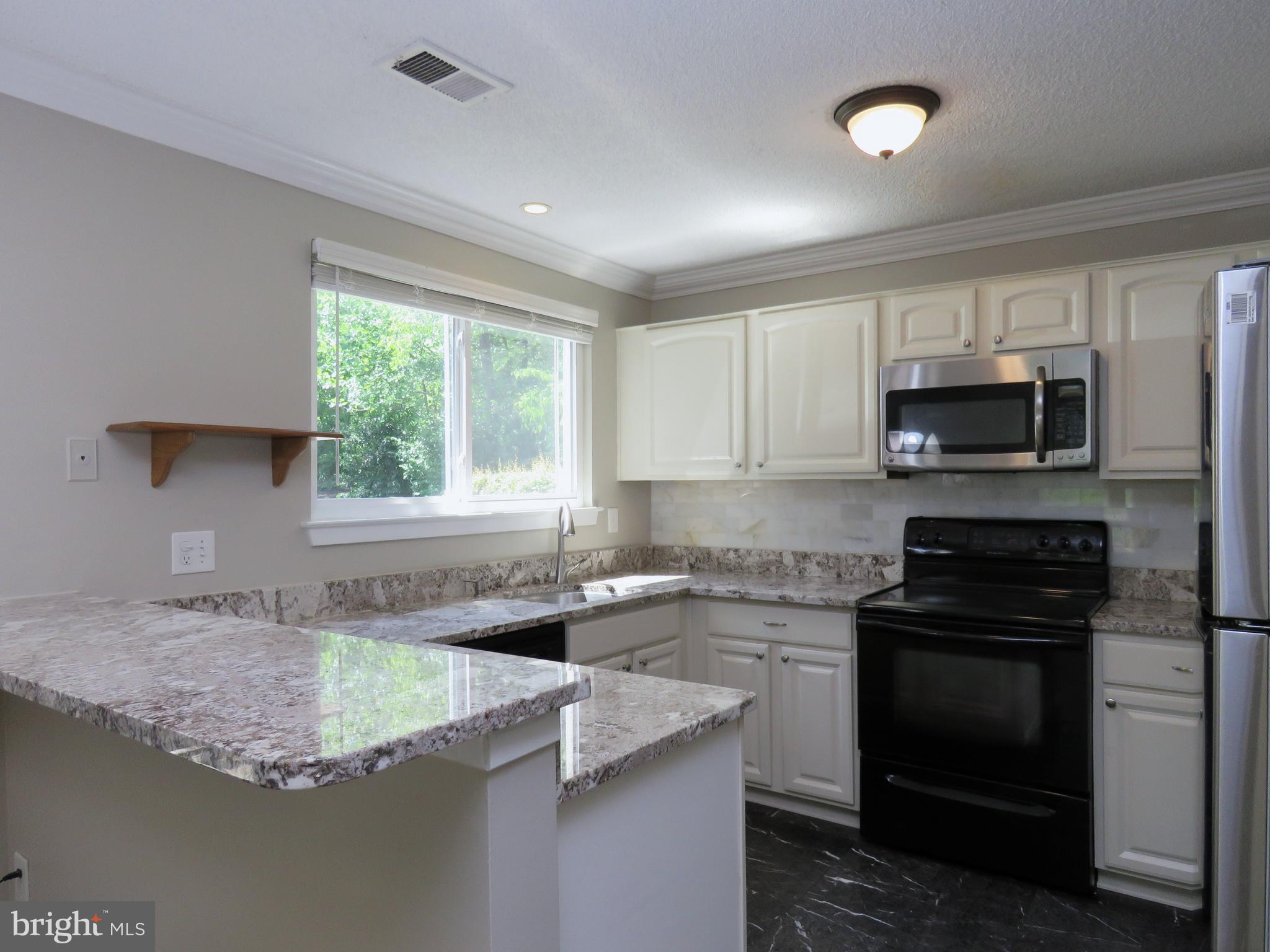 11701 Summerchase Circle, Unit A Reston, VA 20194 - Photo 2 of 32 Kitchen