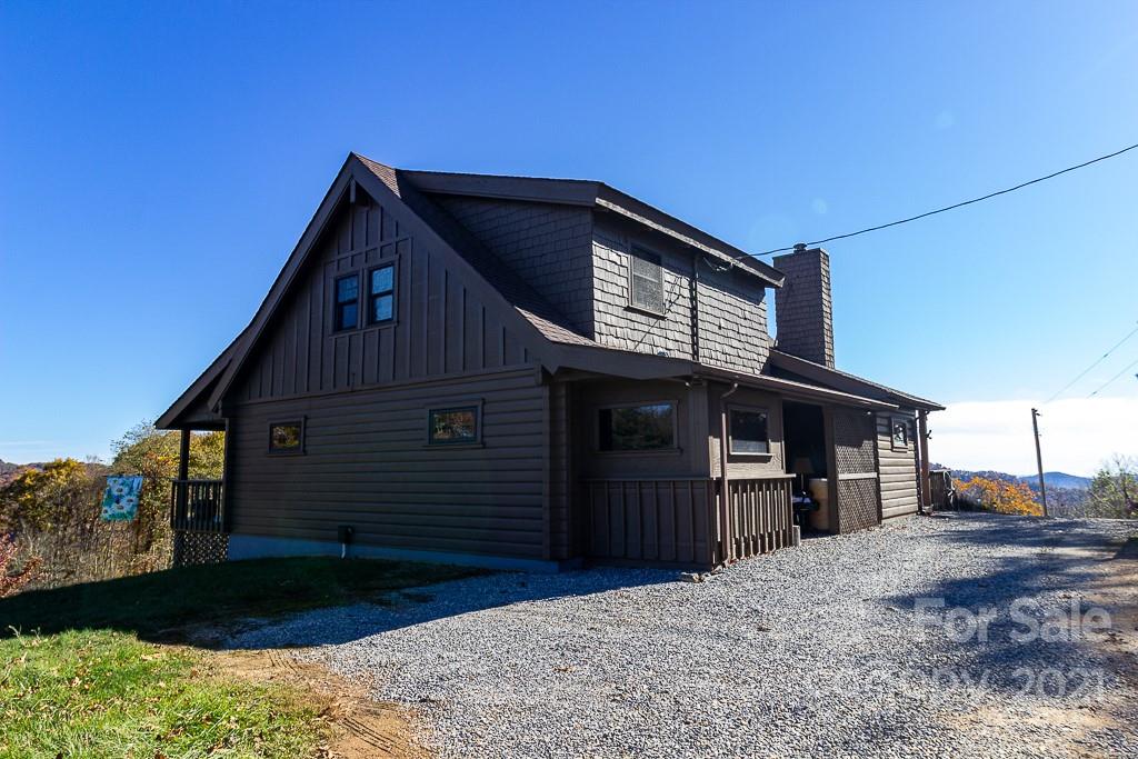 620 Pioneer Ridge Road Canton, NC 28716 - Photo 41 of 42 a front view of a house with a yard