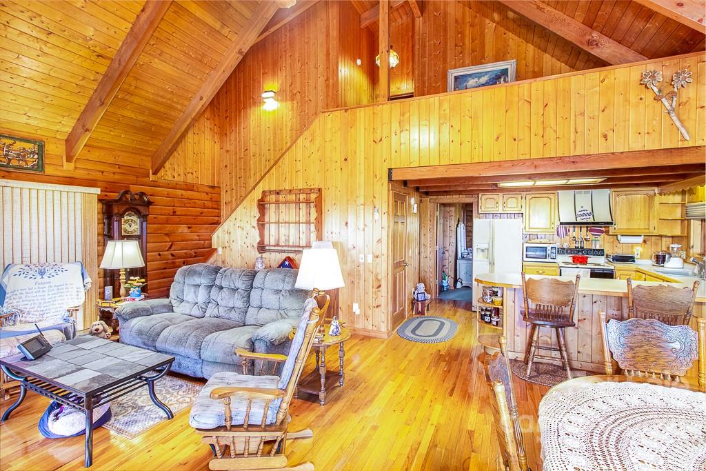 620 Pioneer Ridge Road Canton, NC 28716 - Photo 10 of 42 a living room with furniture and a window