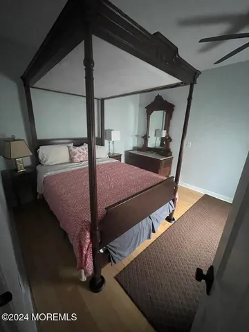 a bed room with a bed and a window