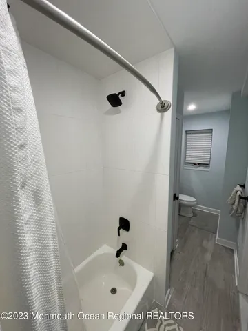 a bathroom with a bathtub