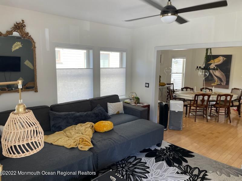73 Cookman Avenue, Unit A Ocean Grove, NJ 07756 - Photo 6 of 20 a living room with furniture rug and window