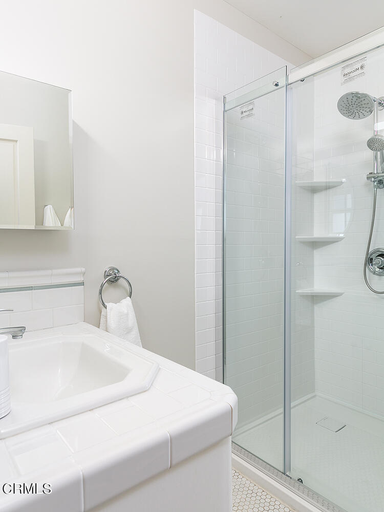 420 Northcliff Road Pasadena, CA 91107 - Photo 17 of 25 a bathroom with a shower and a sink
