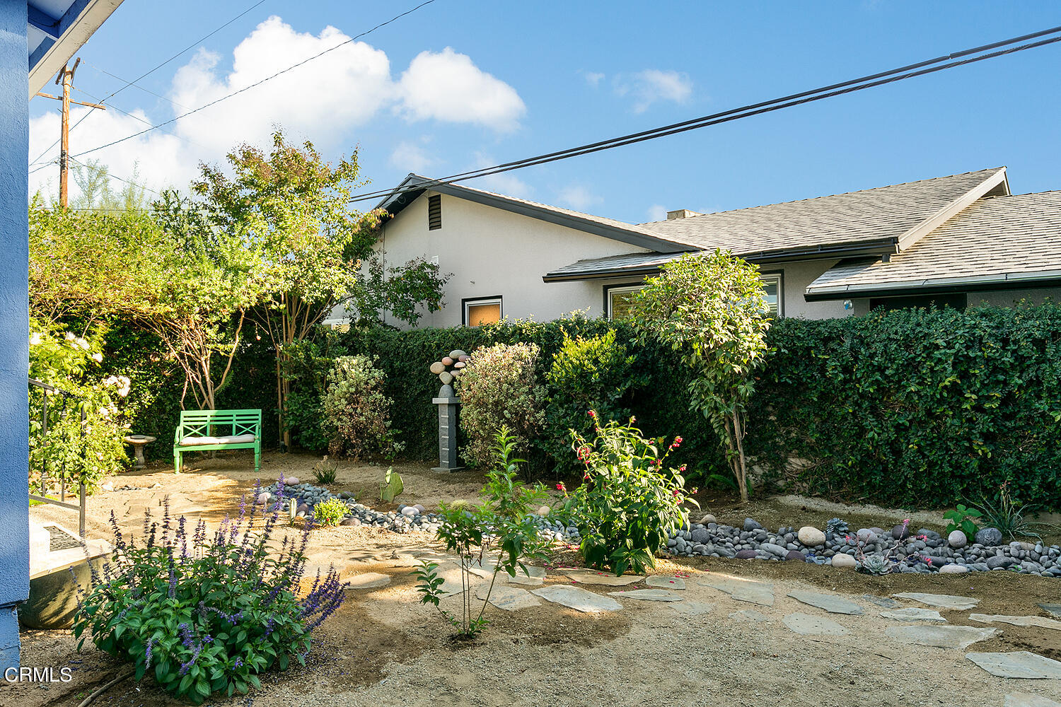 420 Northcliff Road Pasadena, CA 91107 - Photo 22 of 25 a backyard of a house with plants and large trees