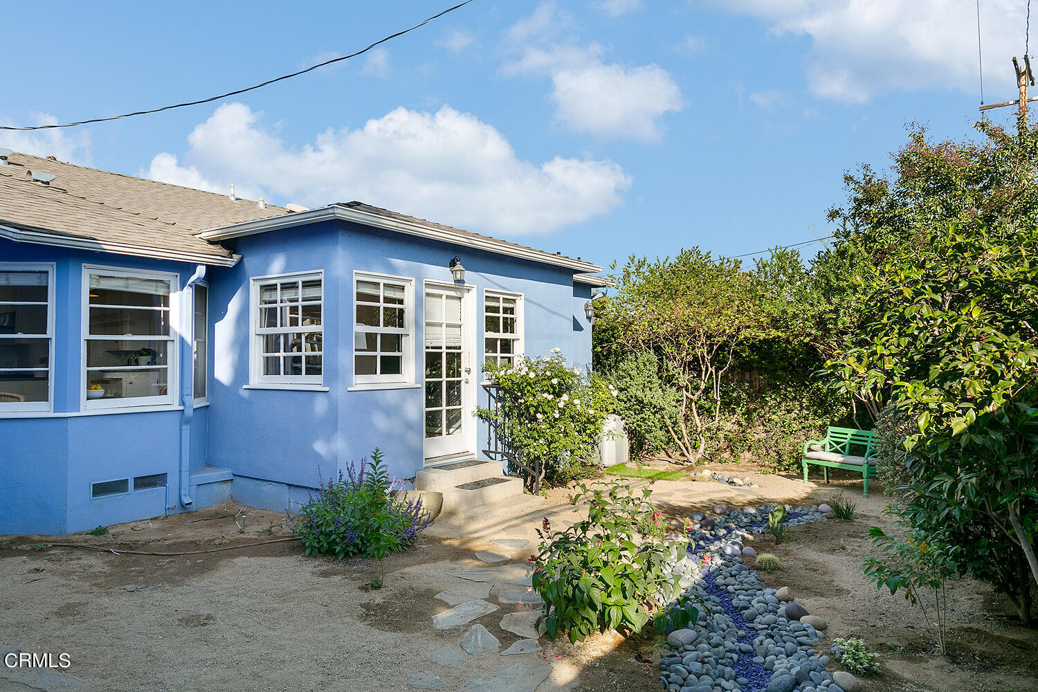 420 Northcliff Road Pasadena, CA 91107 - Photo 23 of 25 a front view of a house with a yard