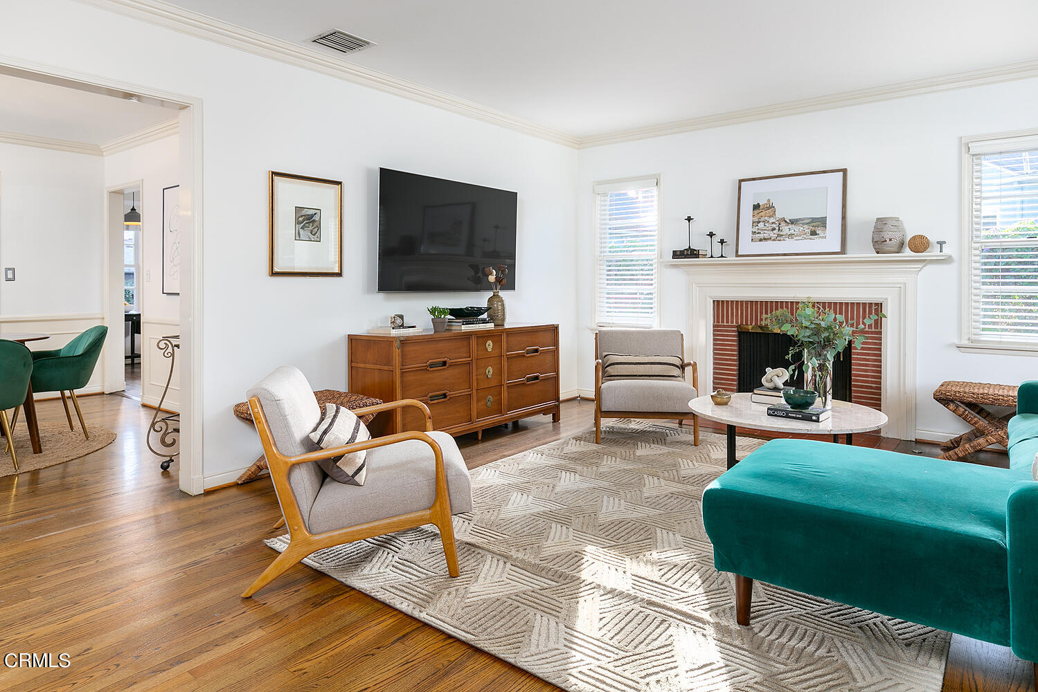 420 Northcliff Road Pasadena, CA 91107 - Photo 4 of 25 a living room with furniture a flat screen tv and a fireplace