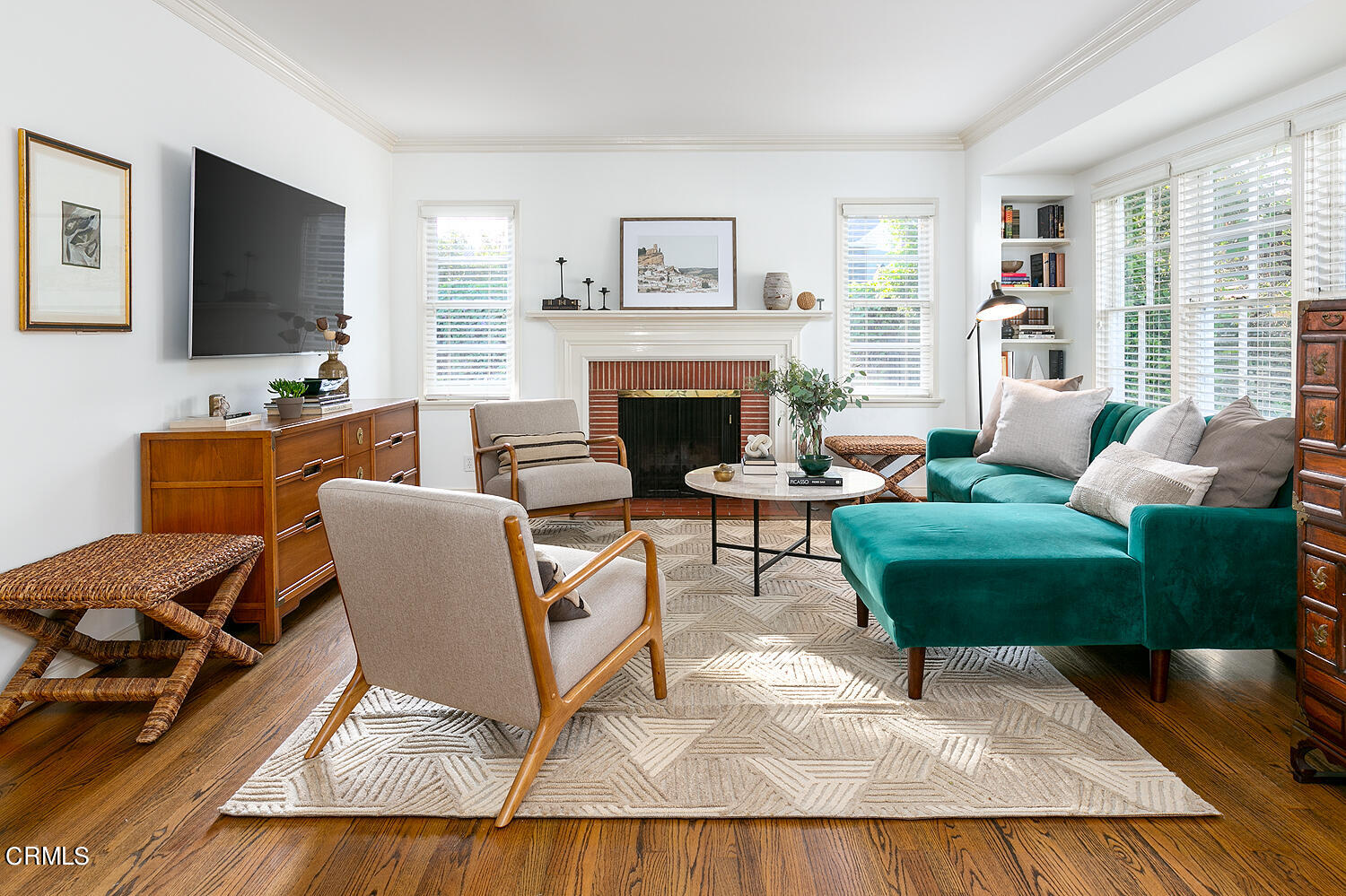 420 Northcliff Road Pasadena, CA 91107 - Photo 5 of 25 a living room with furniture a flat screen tv and a fireplace