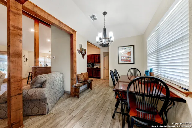 a view of a livingroom with furniture and window