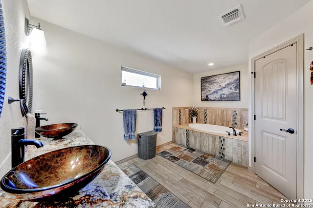 a room with furniture and wooden floor