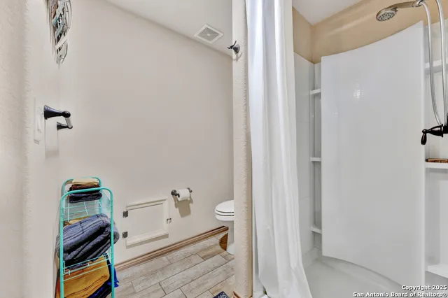 a bathroom with a toilet