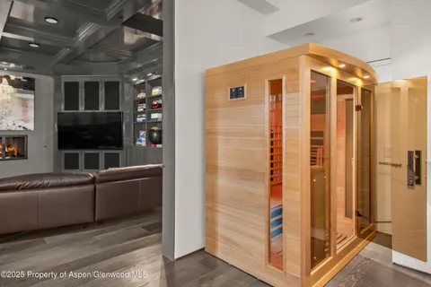 a bedroom with a bed and a desk