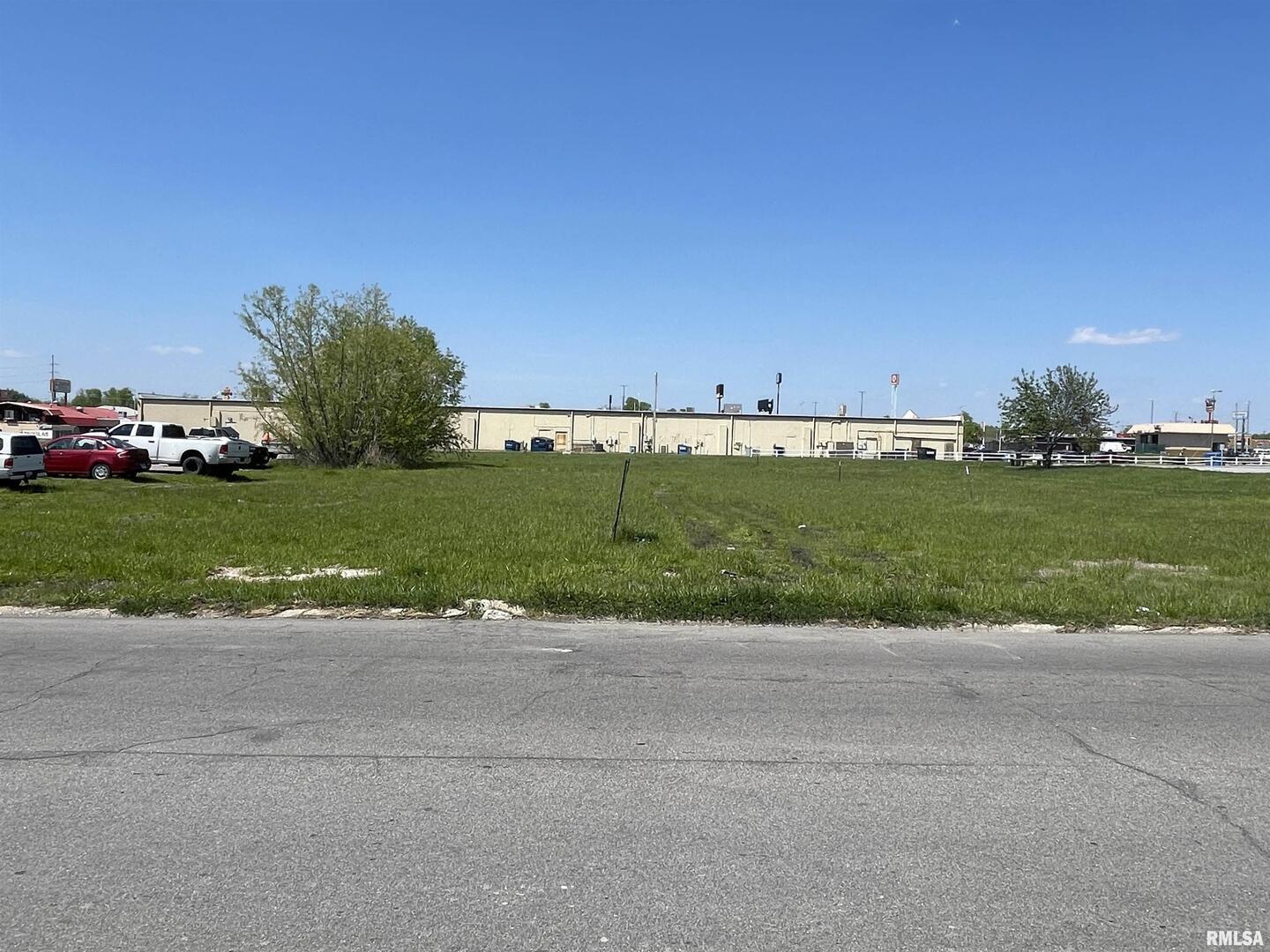 Tbd Coolidge Street Marion, IL 62959 - Photo 2 of 4 a view of a field with a building in background