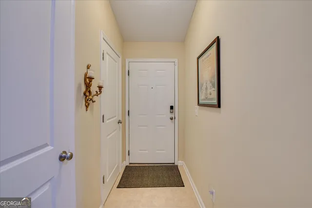 a view of a bathroom from a hallway