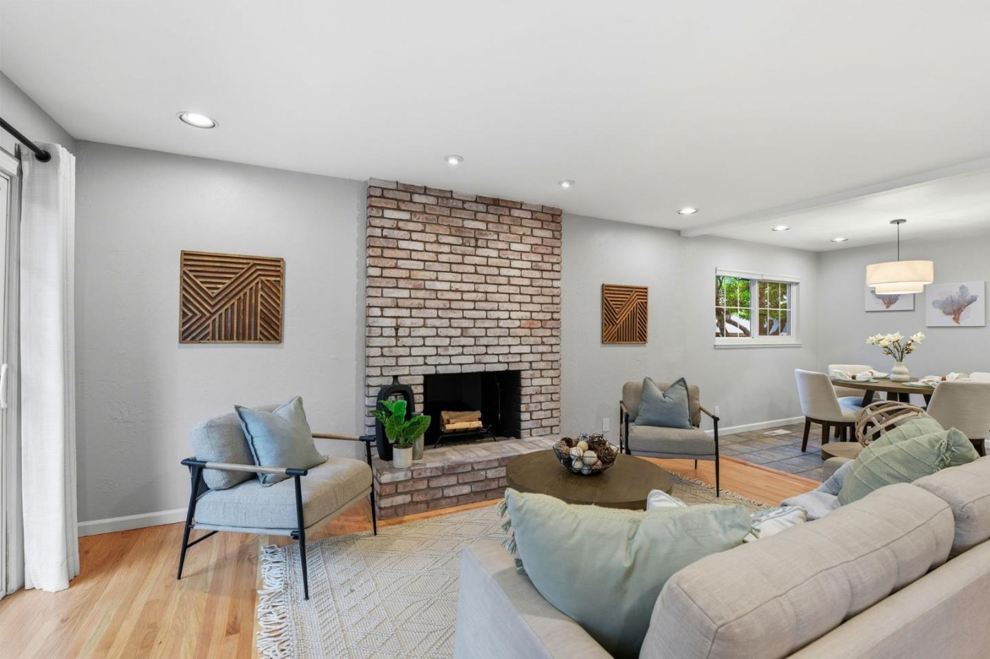 1663 Curtner Avenue San Jose, CA 95125 - Photo 15 of 57 a living room with furniture wooden floor and a fireplace