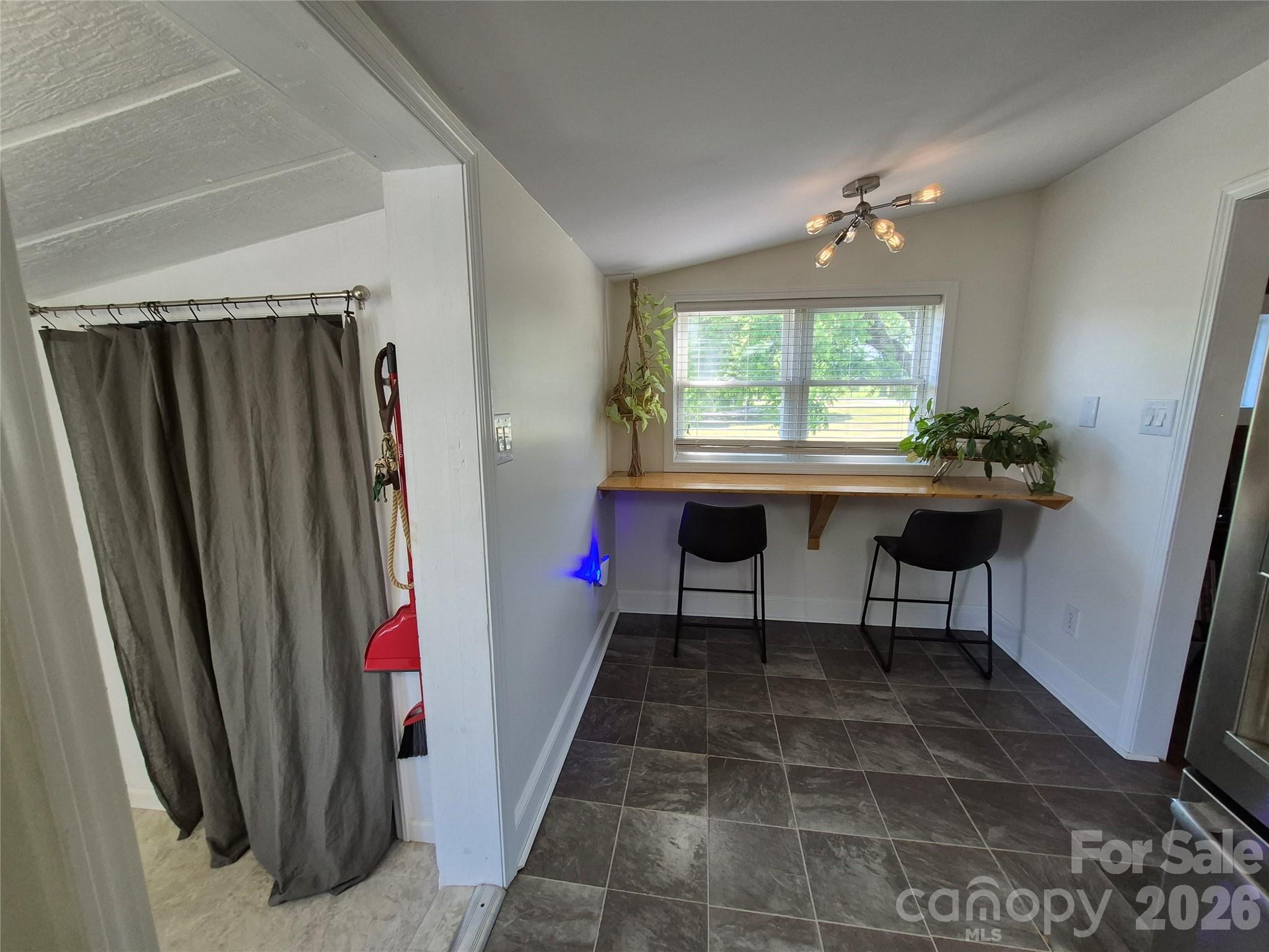 4438 Reepsville Road Vale, NC 28168 - Photo 22 of 32 a room with a table and a window