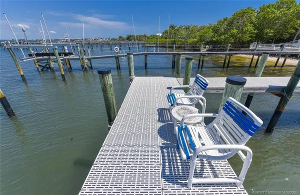 a view of a balcony with chairs