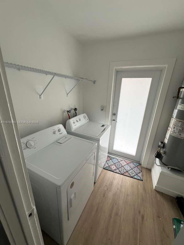 6220 Northwest 19th Street Sunrise, FL 33313 - Photo 11 of 21 a utility room with dryer and washer