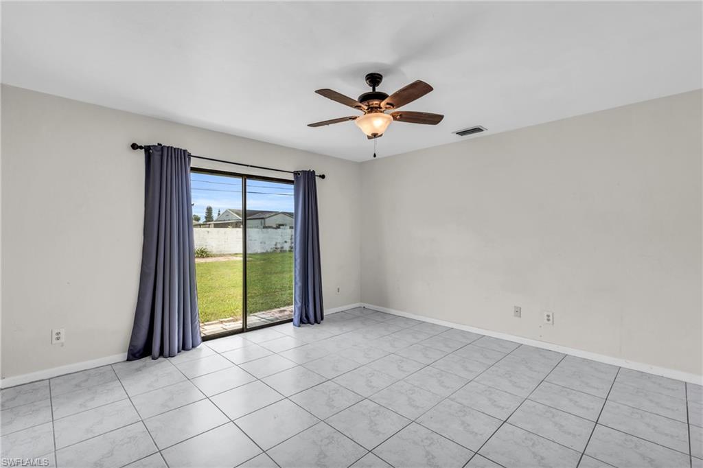 2264 53rd Street Southwest Naples, FL 34116 - Photo 20 of 40 Empty room with ceiling fan