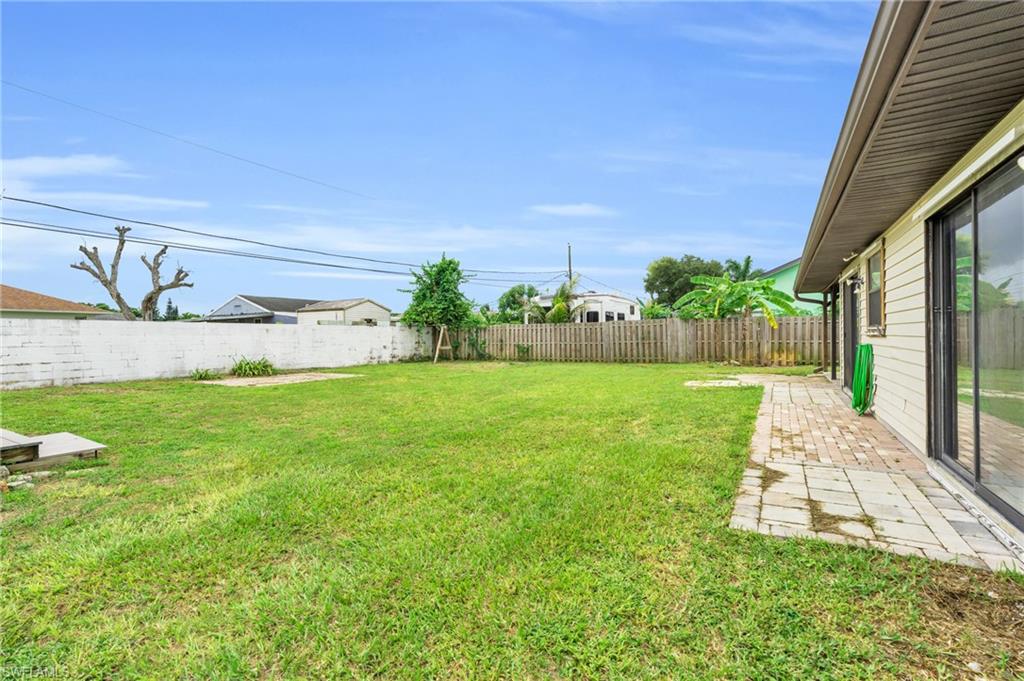 2264 53rd Street Southwest Naples, FL 34116 - Photo 35 of 40 View of yard with a patio
