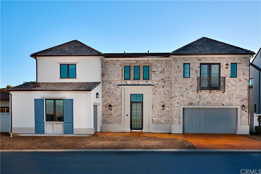 28 Phillips Ranch Road Rolling Hills Estates, CA 90274 - Photo 1 of 1 a front view of a house with a yard and garage
