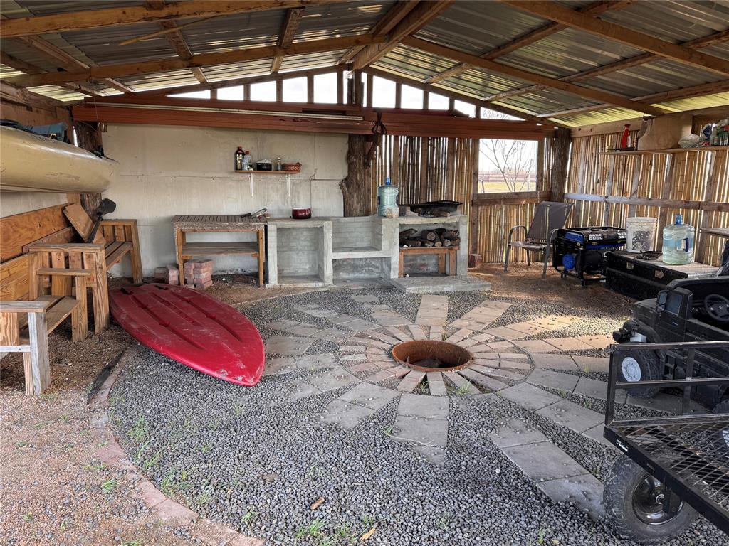 129 County Road 129 Marlin, TX 76661 - Photo 1 of 27 a living room with furniture a flat screen tv and a table