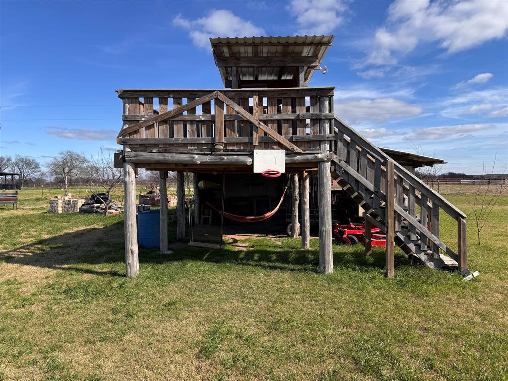 129 County Road 129 Marlin, TX 76661 - Photo 14 of 27 a view of a house with a yard