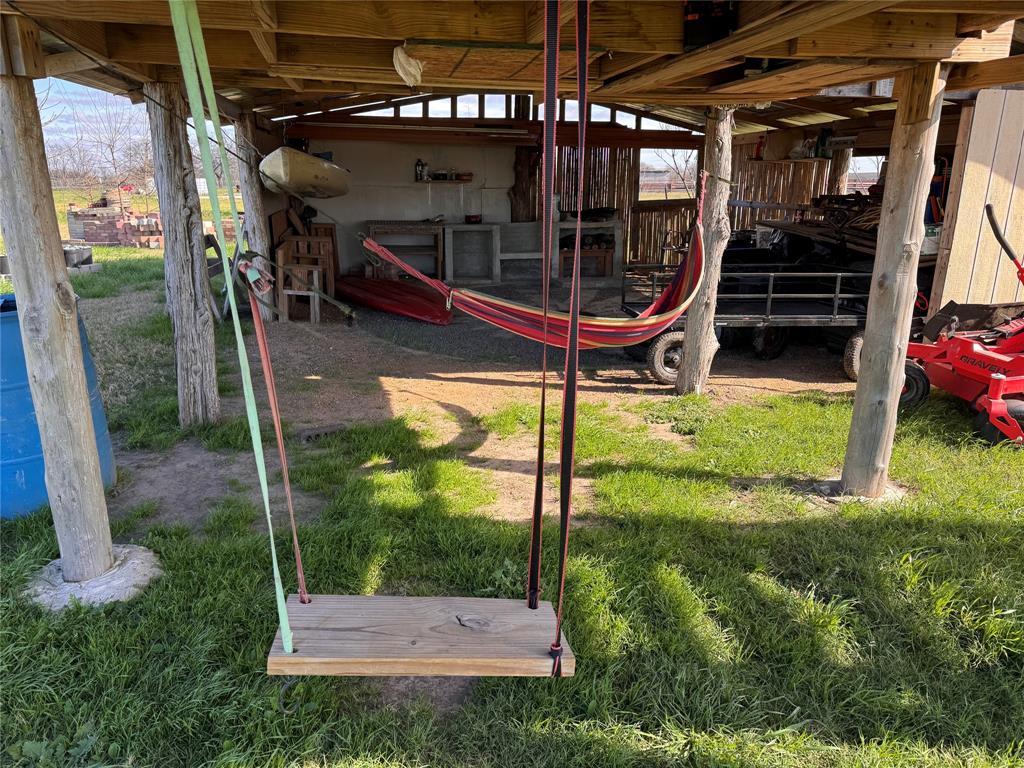 129 County Road 129 Marlin, TX 76661 - Photo 2 of 27 a view of swimming pool with a yard