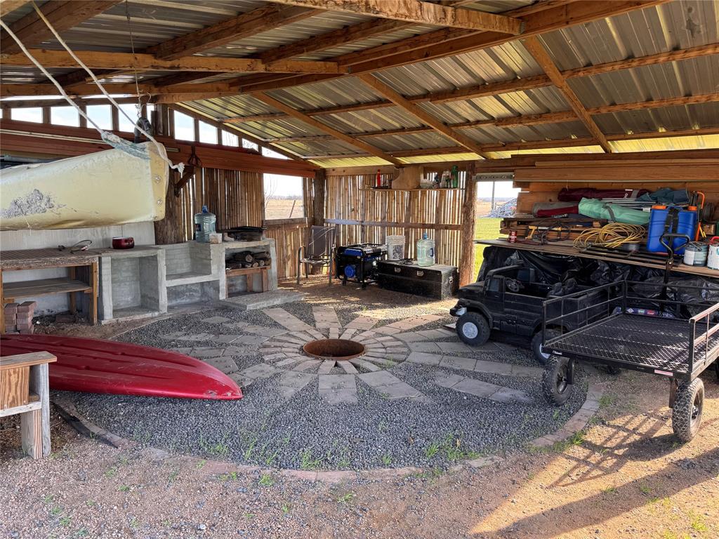 129 County Road 129 Marlin, TX 76661 - Photo 27 of 27 a car is parked in a garage