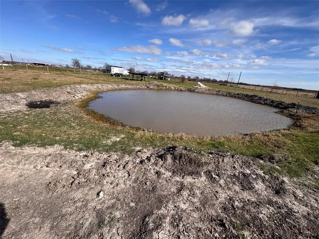 a view of a lake with beach and ocean view