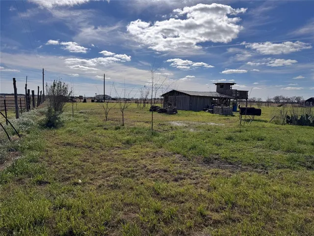 a view of a garden with an outdoor space