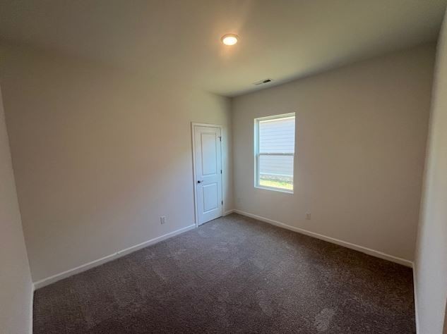 3244 Hearth Hollow Road Columbia, TN 38401 - Photo 11 of 32 an empty room with a empty space and windows