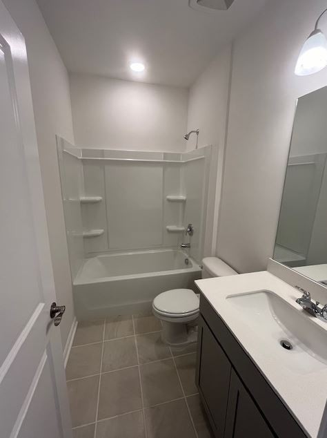 3244 Hearth Hollow Road Columbia, TN 38401 - Photo 12 of 32 a bathroom with a sink toilet a mirror and shower