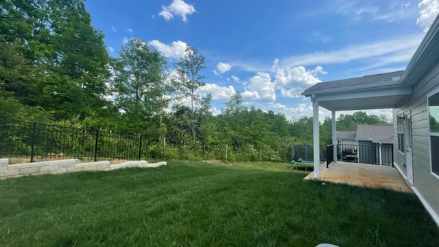 3244 Hearth Hollow Road Columbia, TN 38401 - Photo 13 of 32 a view of a house with backyard and a patio