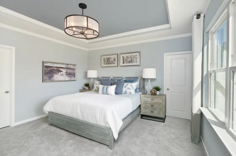 3244 Hearth Hollow Road Columbia, TN 38401 - Photo 18 of 32 a spacious bedroom with a bed and a chandelier