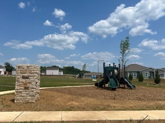 3244 Hearth Hollow Road Columbia, TN 38401 - Photo 26 of 32 a view of a park with swings and slides
