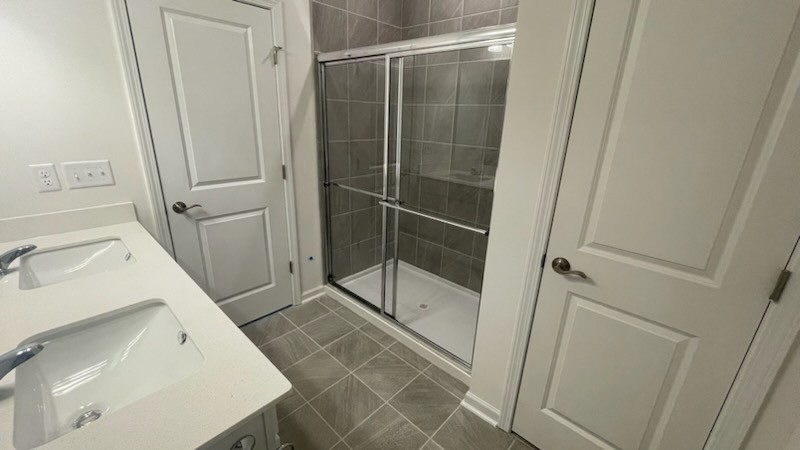 3244 Hearth Hollow Road Columbia, TN 38401 - Photo 8 of 32 a bathroom with a sink and a shower