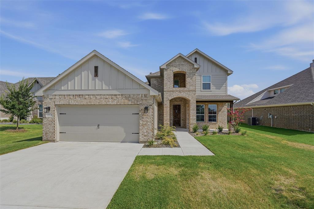 1113 Trinity Drive Springtown, TX 76082 - Photo 2 of 40 Brick and siding exterior with a two-car garage, concrete driveway, and front walkway