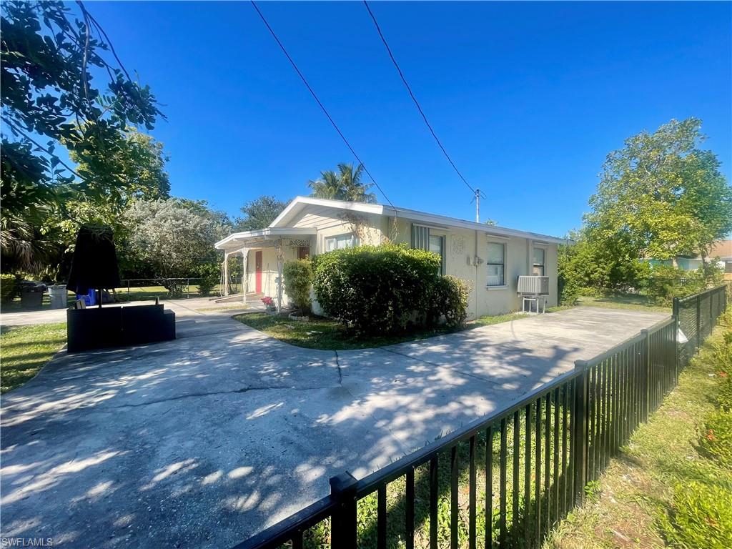 1339 5th Avenue North Naples, FL 34102 - Photo 2 of 17 View of side of property