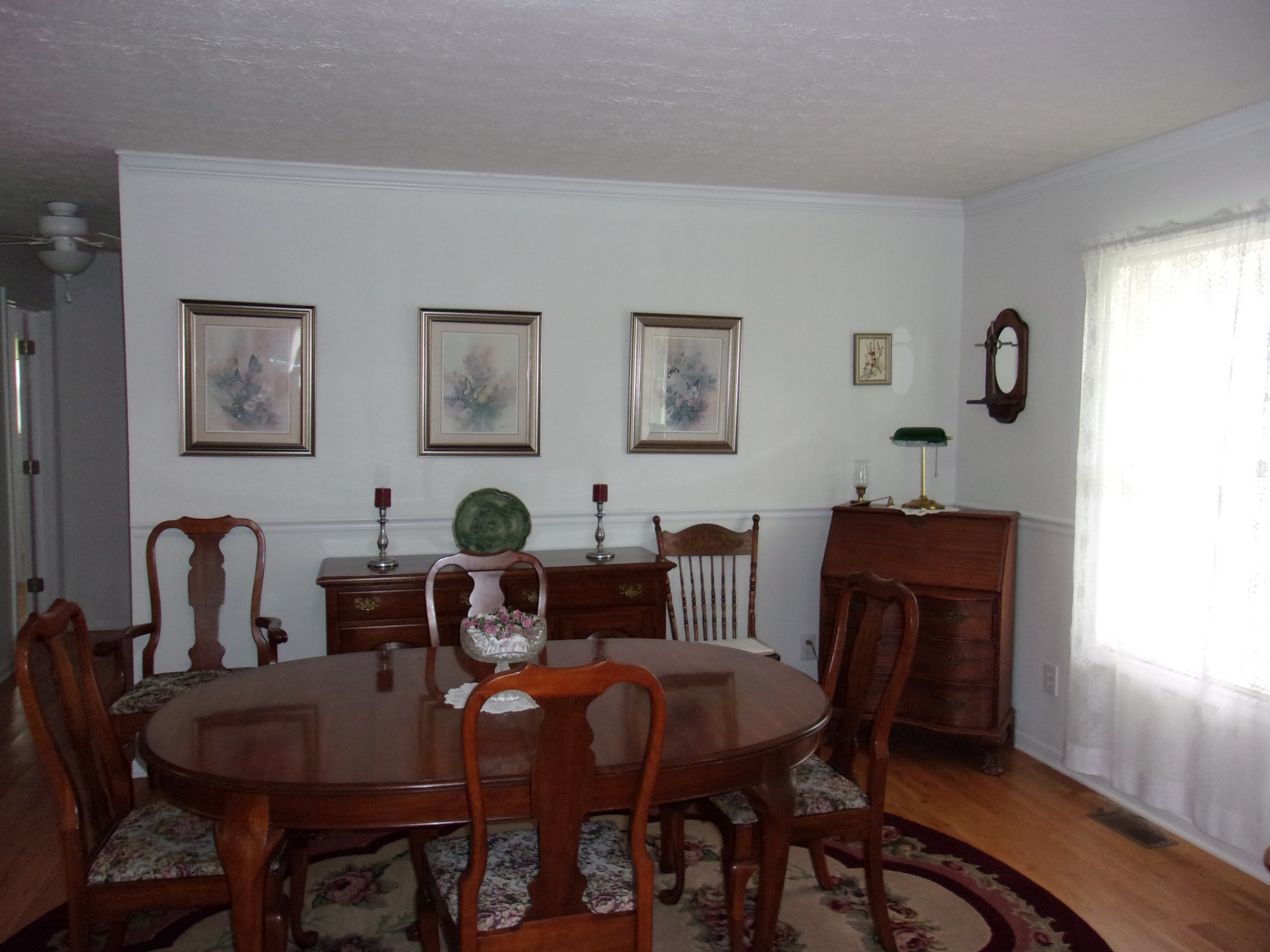 248 Spring Meadows Lane Morrison, TN 37357 - Photo 13 of 36 a view of a dining room with furniture and wooden floor