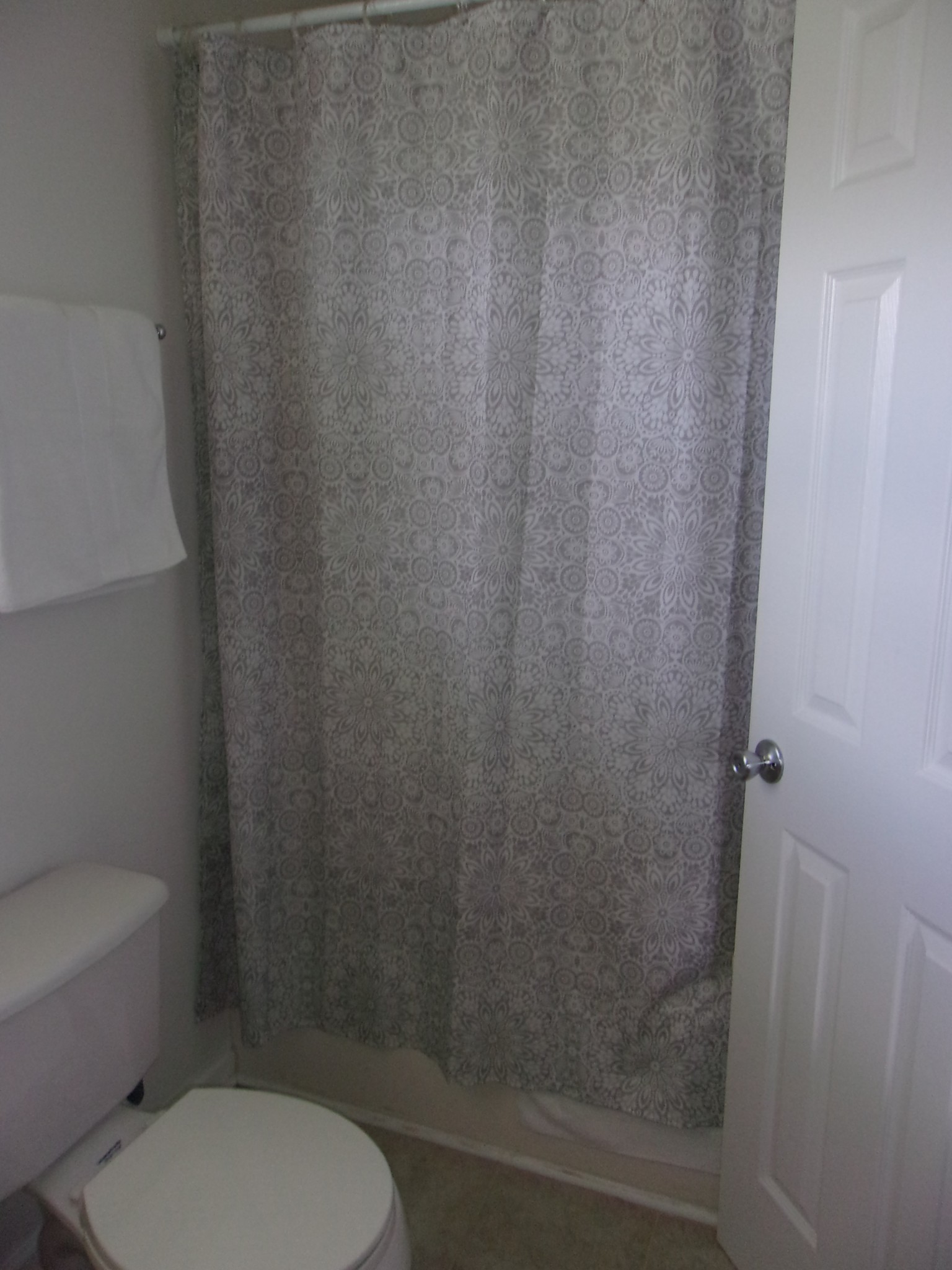 248 Spring Meadows Lane Morrison, TN 37357 - Photo 20 of 36 a white toilet sitting next to a shower