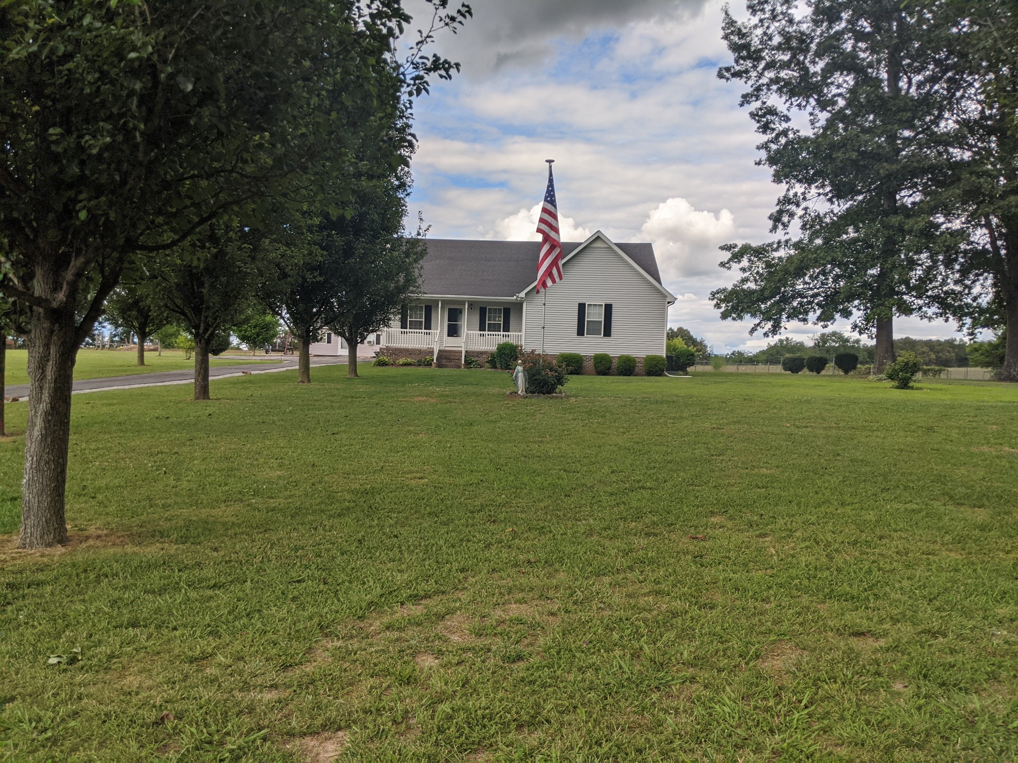 248 Spring Meadows Lane Morrison, TN 37357 - Photo 2 of 36 a front view of a house with a yard
