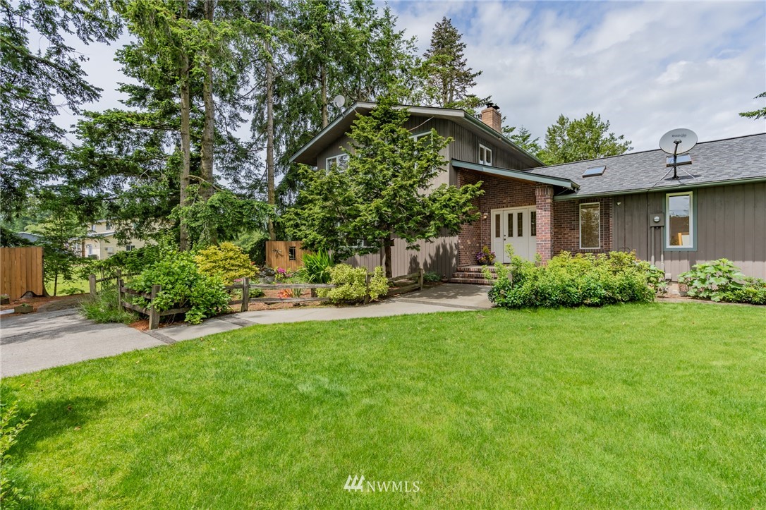 1792 Burk Road Blaine, WA 98230 - Photo 3 of 40 a view of a house with a garden