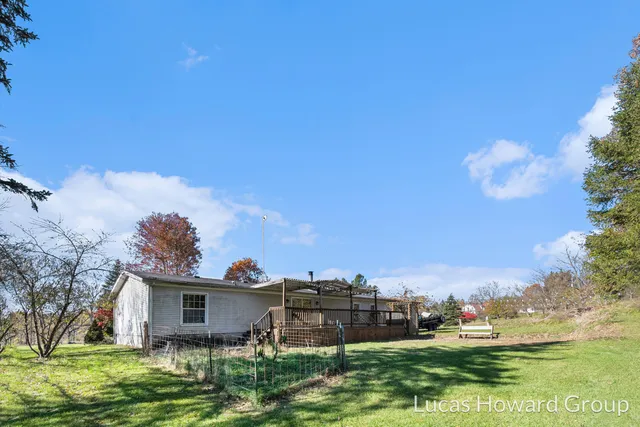 $209,900 | 6928 Hubbardston Road, Hubbardston, MI 48845