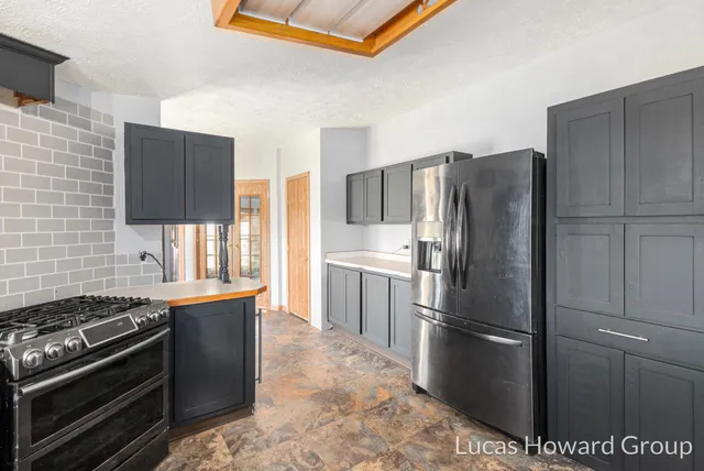 $209,900 | 6928 Hubbardston Road, Hubbardston, MI 48845