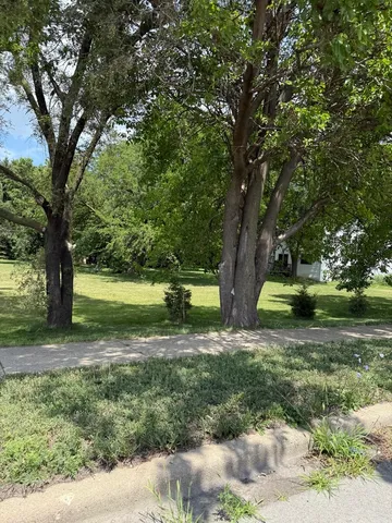 a view of a garden with trees