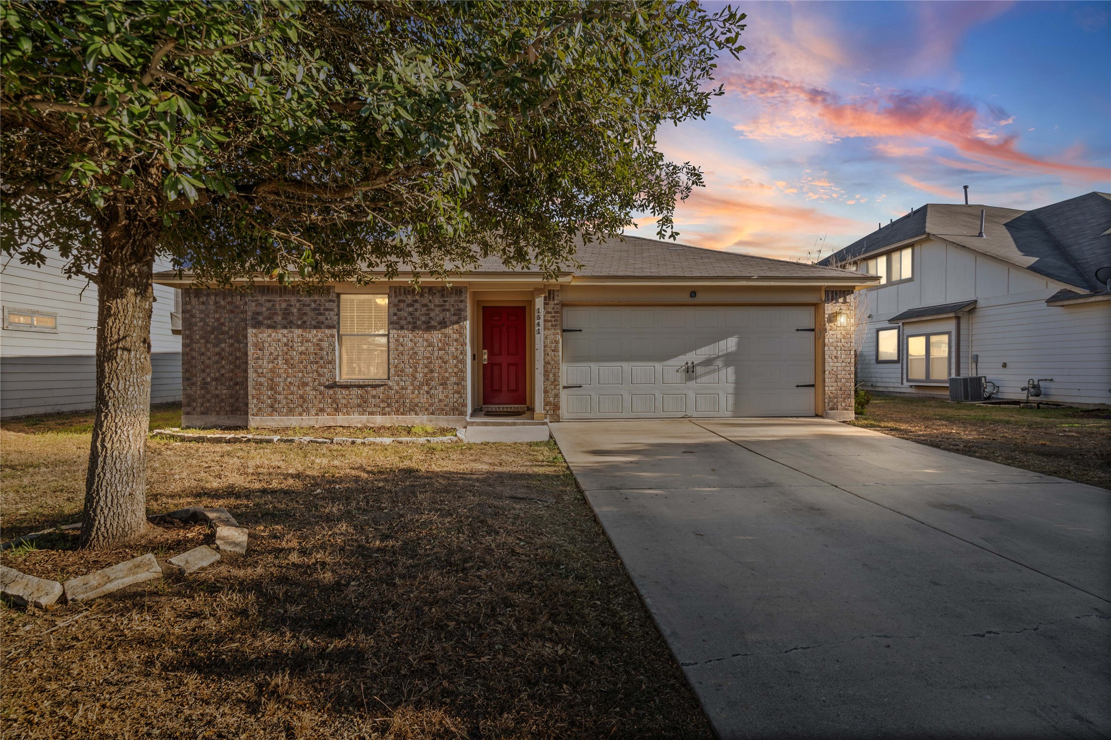 a front view of house with yard